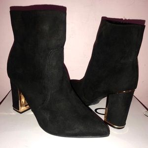 Black high heel pointy toe ankle boots